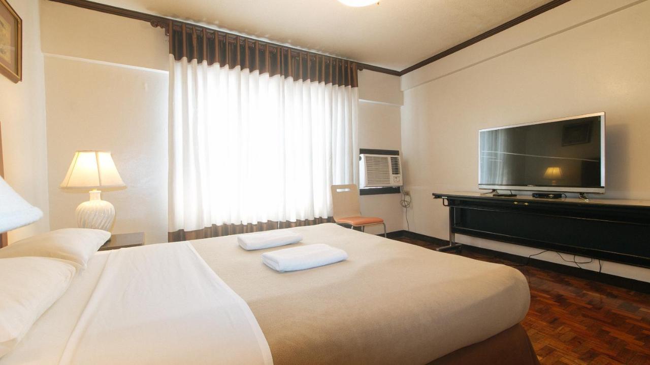 El Rico Suite Makati By Reddoorz Макати Экстерьер фото